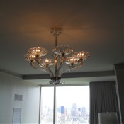 Glass chandelier installed flush on low ceiling Apt in Central Park West, New York, NY.
